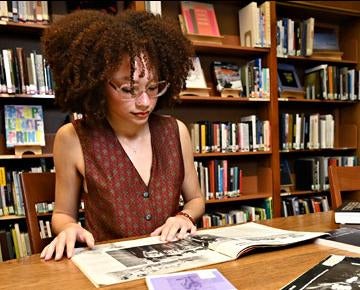 A student works on research.